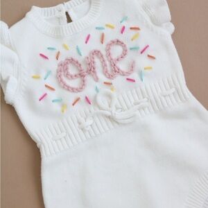 One Year White Knit Baby Romper with Drawstring